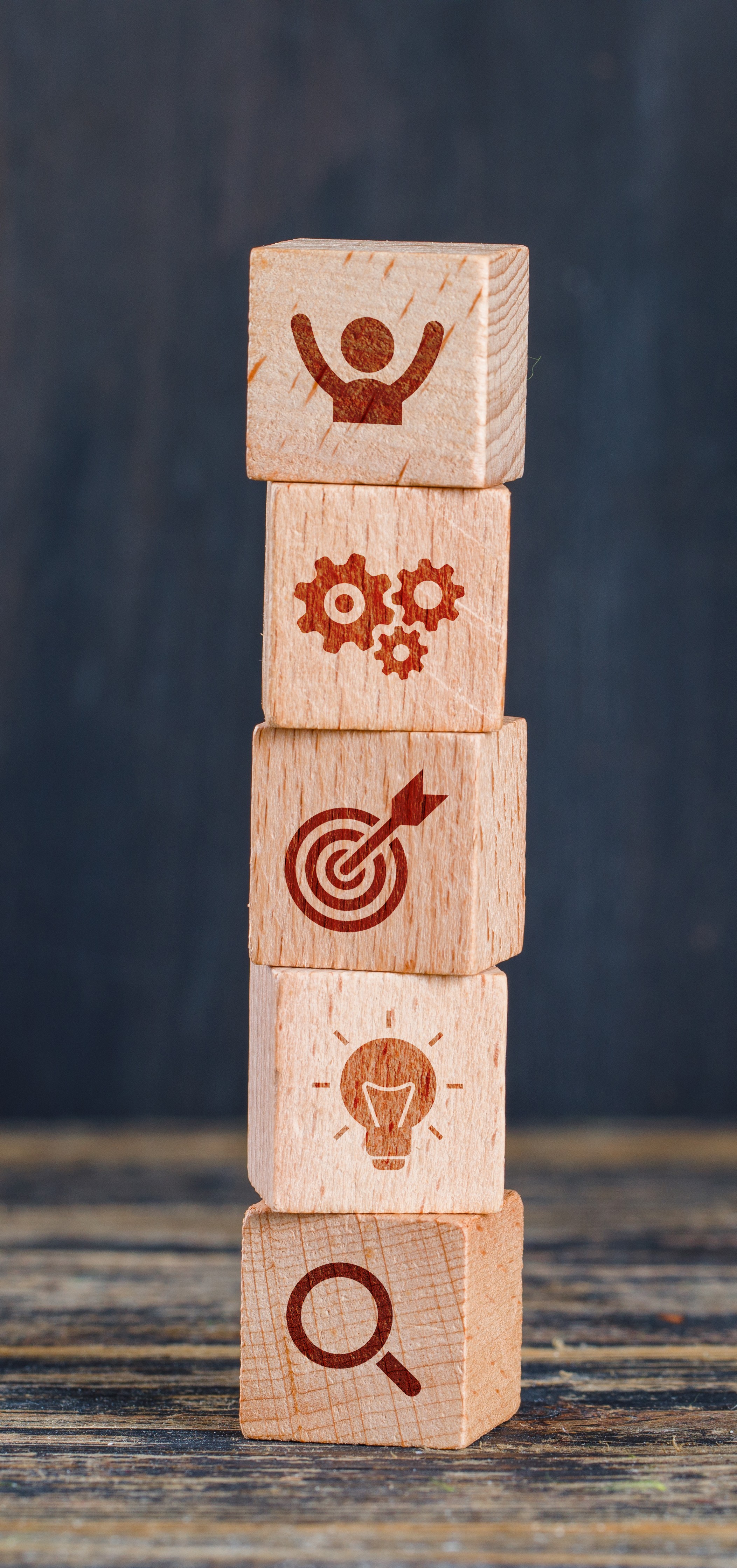 Project approach visualization with wooden blocks